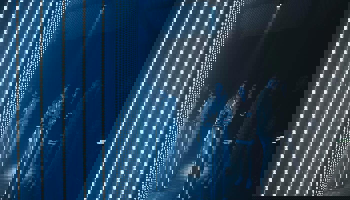 Lady looking at white lights. 