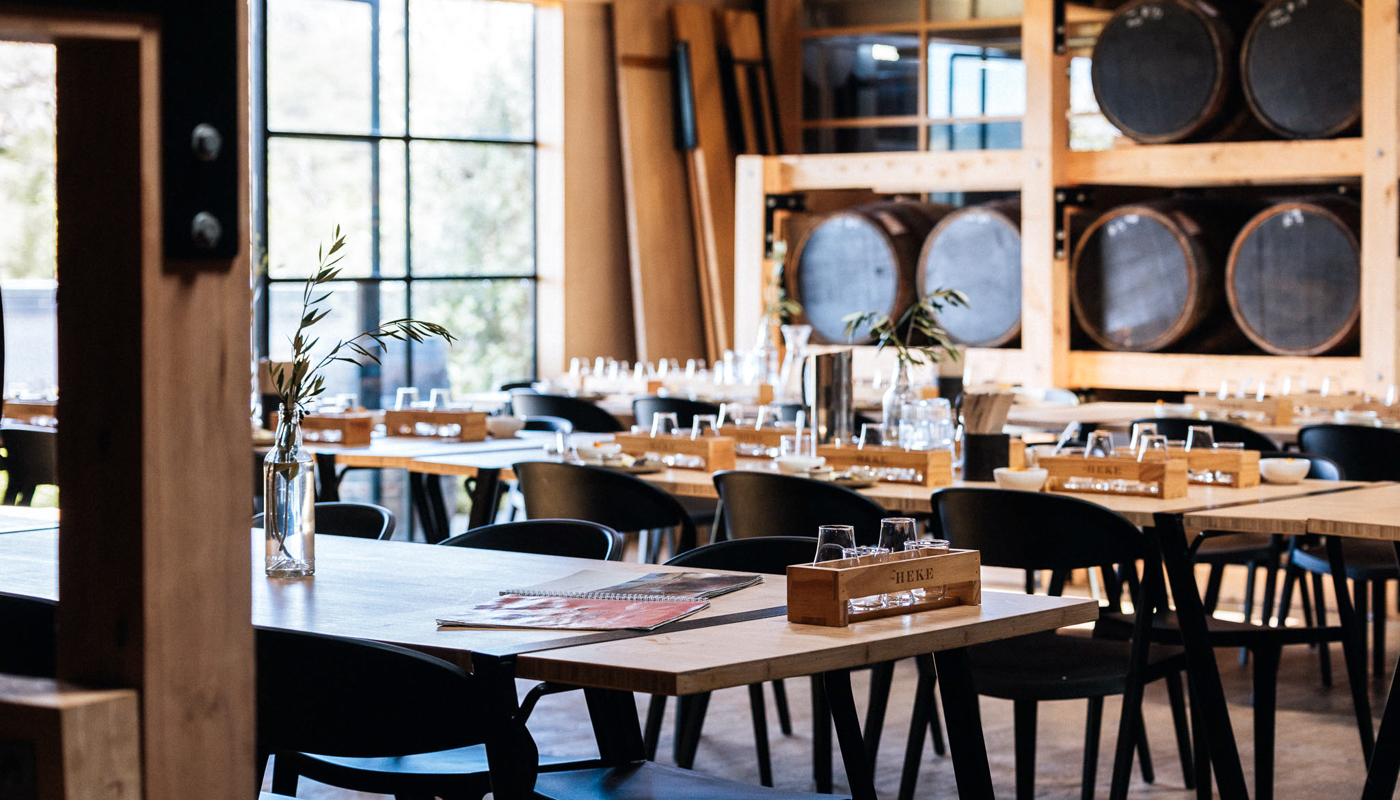 Interior view of Waiheke Whisky with tables setup for dining